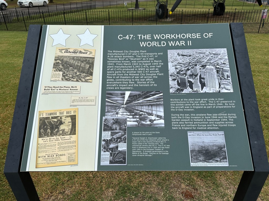 Information board about the C-47 aircraft, detailing its production during World War II at the Midwest City Douglas Plant, including historical photos and text highlighting its significance and contributions to the war effort.