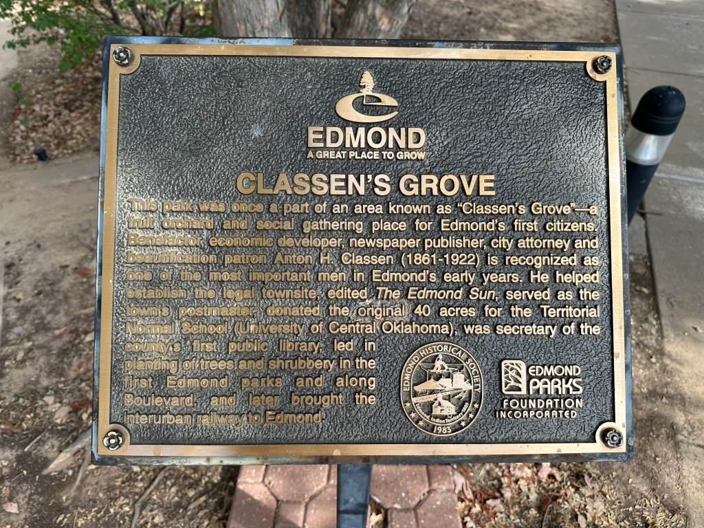 Historic marker for Classen's Grove in Edmond, Oklahoma detailing its significance as a fruit orchard and social gathering place for the city's early citizens.