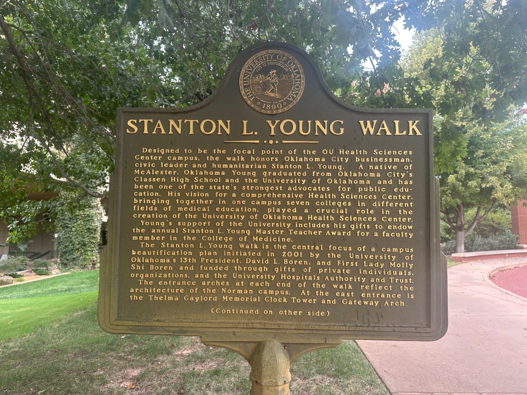 Historic marker for Stanton L. Young Walk at the OU Health Sciences Center, detailing the contributions of Stanton L. Young to medical education and public health in Oklahoma.
