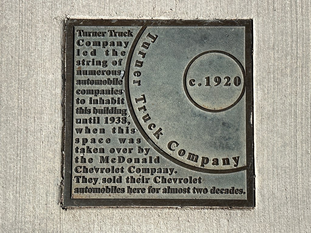 Historic plaque for Turner Truck Company, detailing its history and occupancy in Automobile Alley, Oklahoma City.