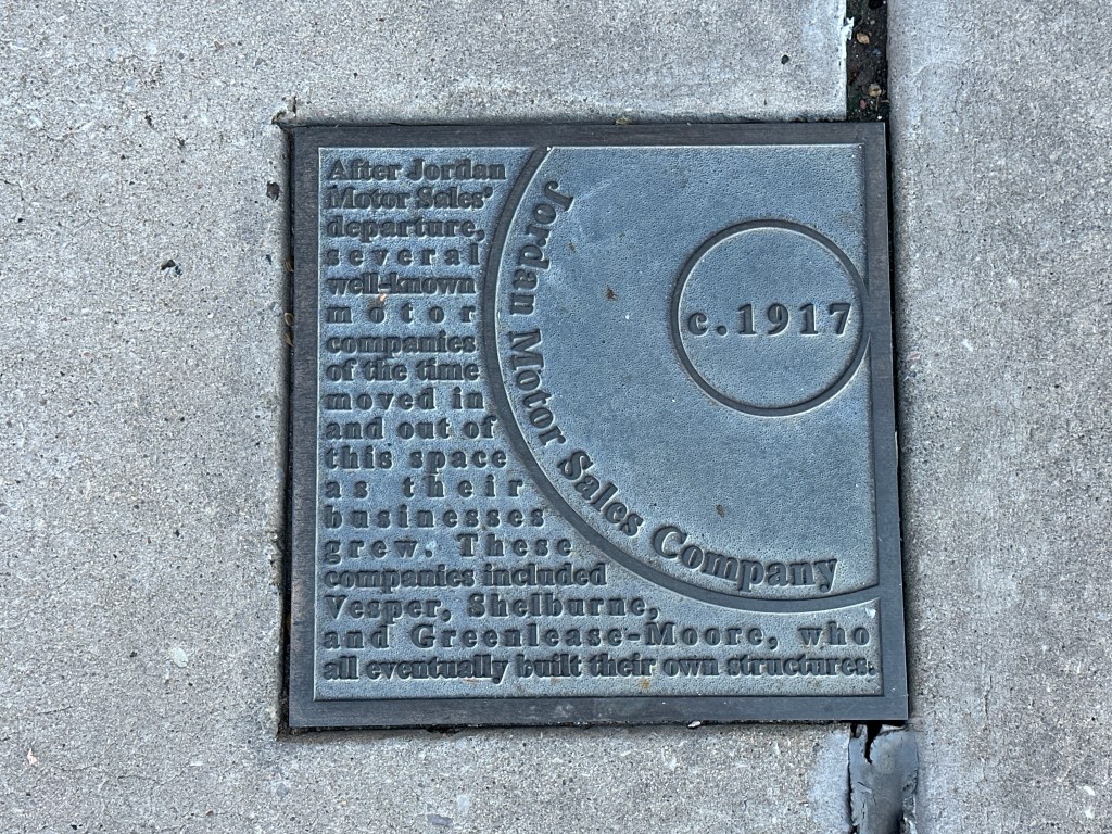 Historic marker plaque for Jordan Motor Sales Company, c. 1917, located on the sidewalk in Automobile Alley.