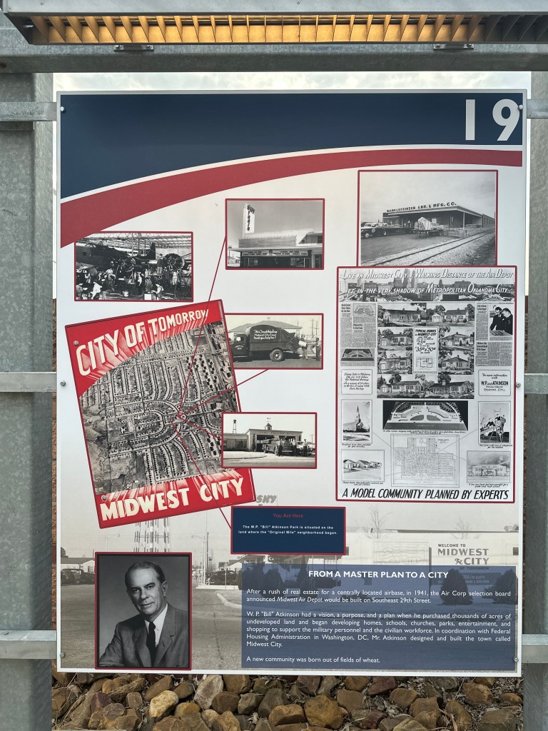 Informational sign about Midwest City, featuring historical photos, a map, and text discussing its development and planning by W.P. 'Bill' Atkinson.
