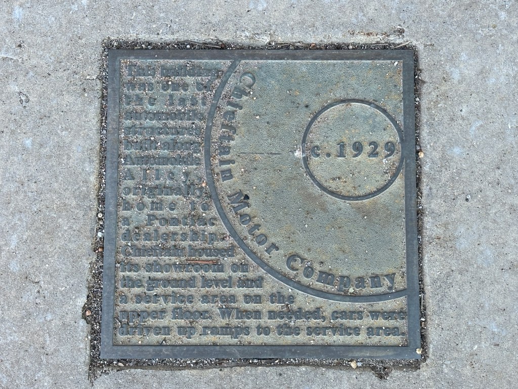 Historic marker plaque for Chieftain Motor Company, established circa 1929, located in the sidewalk of Automobile Alley, Oklahoma City.