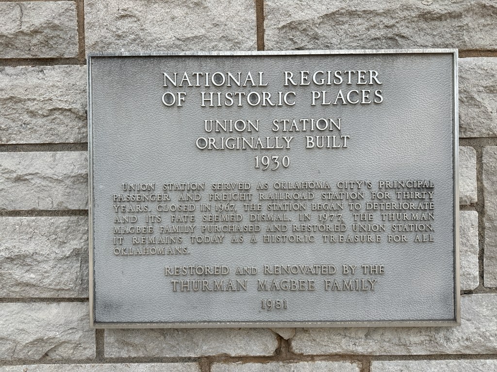 Plaque detailing the history of Union Station in Oklahoma City, including its significance as a railroad station and restoration efforts by the Thurman Magbee Family.