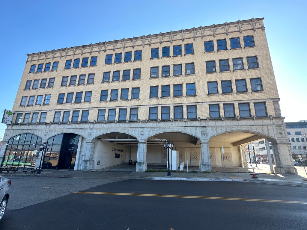 The Magnolia Petroleum Company building in Oklahoma City, showcasing Sullivanesque architecture with a limestone and blonde brick facade.