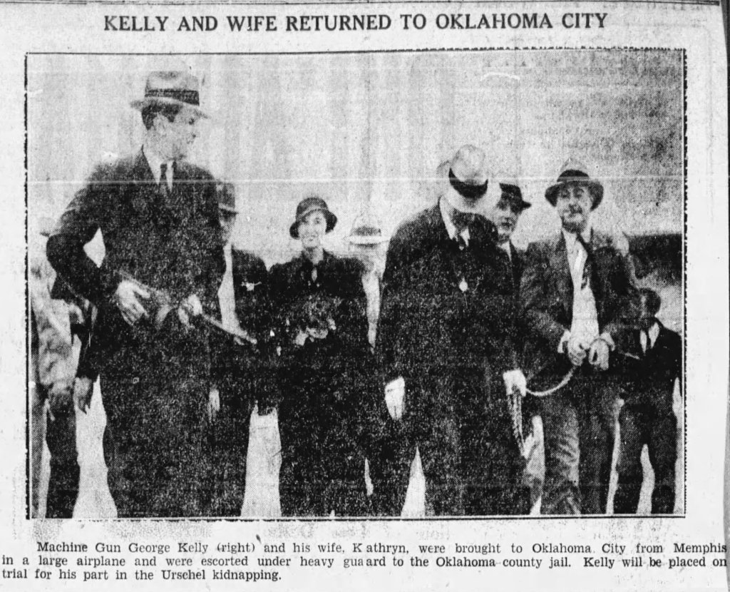 Historic newspaper image showing George 'Machine Gun' Kelly and his wife, Kathryn, being escorted under guard upon their return to Oklahoma City.