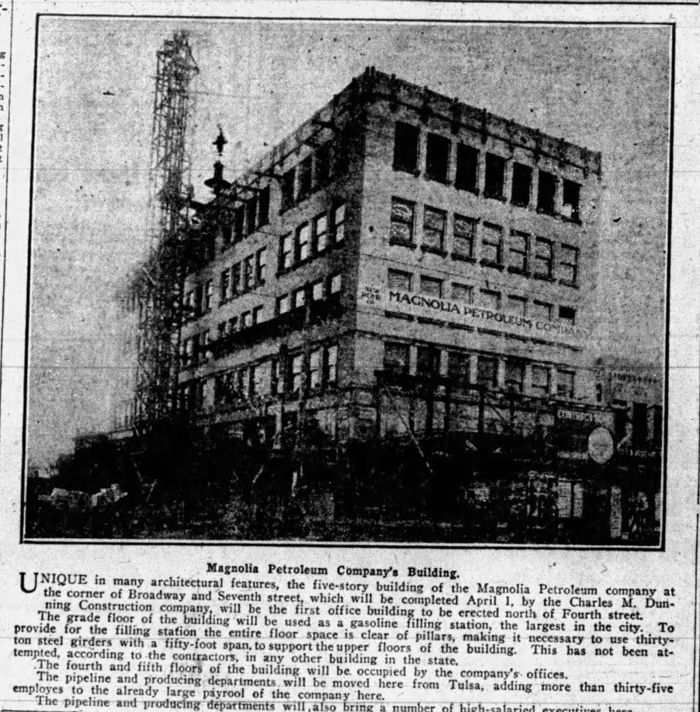 Historic image of the Magnolia Petroleum Company building, showcasing its five-story structure and architectural details during construction.