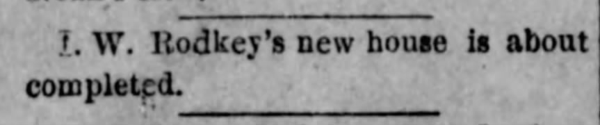 Text from a newspaper article announcing the completion of I.W. Rodkey's new house.